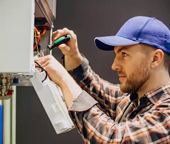 Expert Plumber for Tankless Water Heater Maintenance in Roosevelt, NY: Schedule Professional Maintenance Services with Us