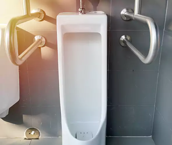 Expert Urinal Installation in Roosevelt, NY: Schedule Reliable Plumbing Services with Us